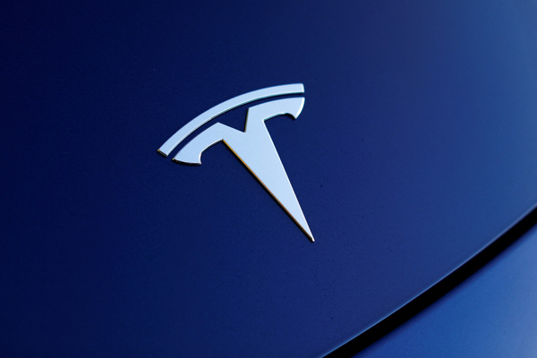 US opens probe of fatal Tesla crash into Texas home