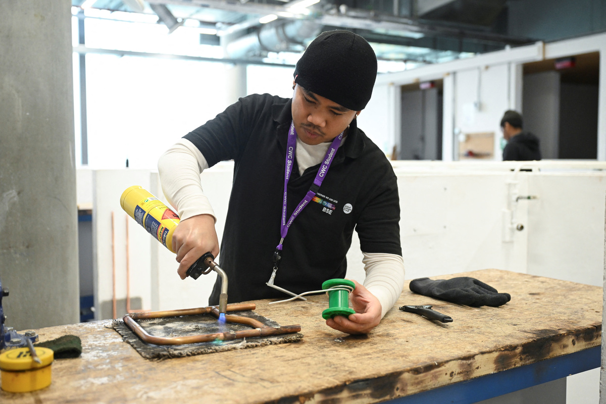 Fearing AI job losses, some young workers in Britain shift towards skilled trades