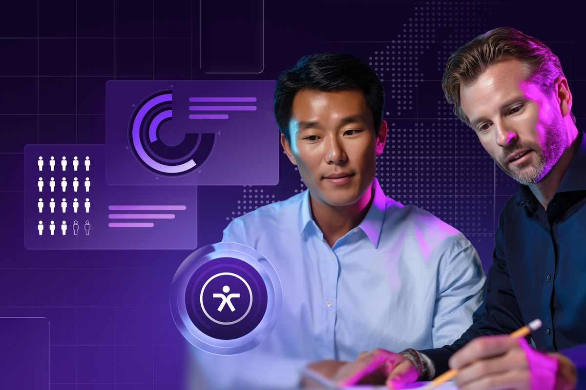Two people collaborating at a desk in front of a purple-toned background with digital analytics graphics. An accessibility icon is displayed in the foreground.